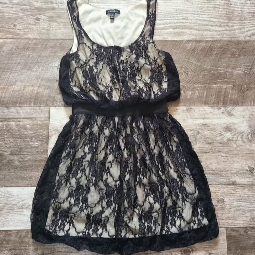 Adorable black lace dress. Nude lining.